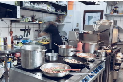 A restaurant's chef who is careless about cooking many different items side by side without following proper measures.