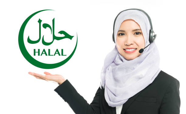 A lady showing the Halal sign