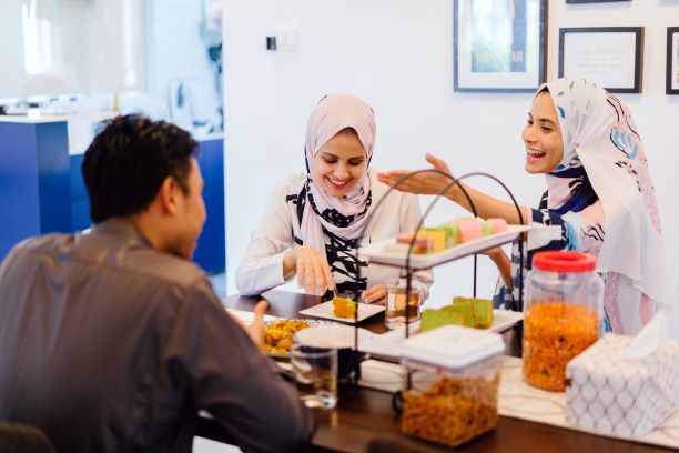 Muslims eating Halal bakery items.