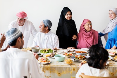 Muslim family enjoying Halal meal together.