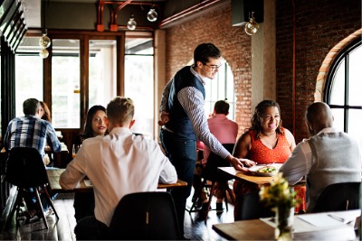 People are having good time in a restaurant.