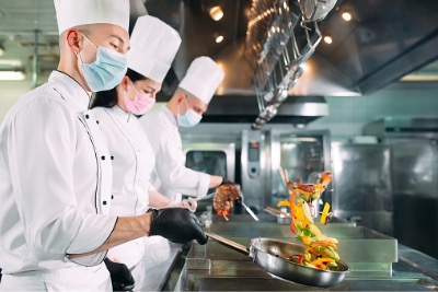 Chefs are preparing meals.