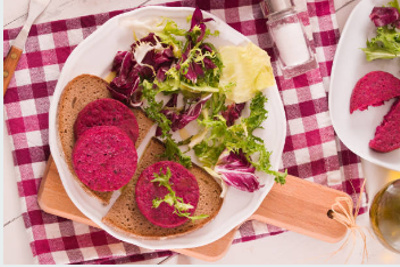 Eating beetroot with salad and toast.