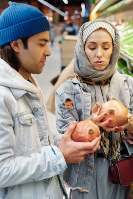 Muslim family looking for a fresh fruit.