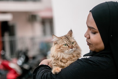 Muslim having a pet.