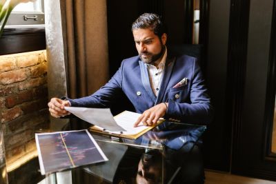 Man checking all the Halal documents.