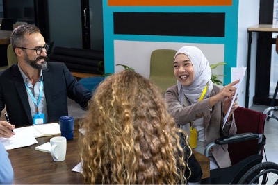 Muslim woman doing a presentation.