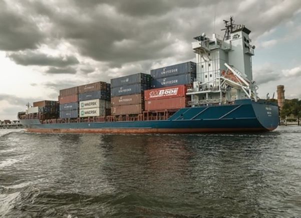 Giant cargo ship with Halal product containers.