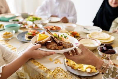 Muslim family having a Halal meal.
