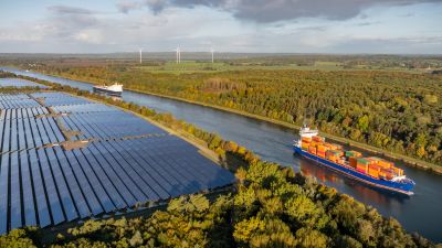 Vast solar panel fields, voyaging ships, and wind turbines.