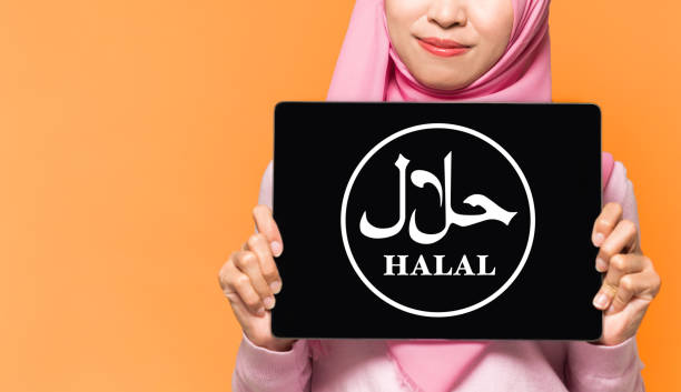 Lady holding Halal sign